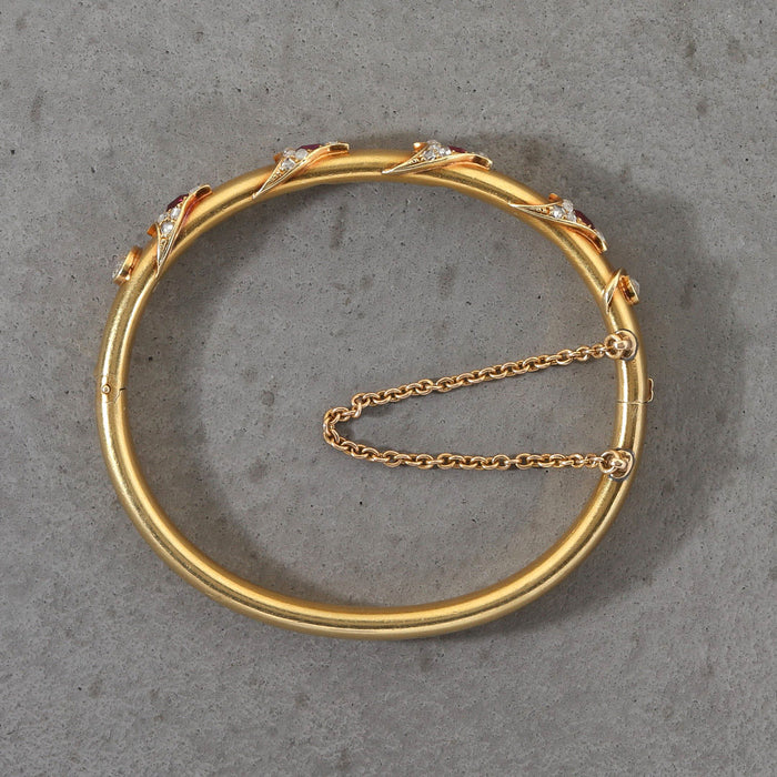 VICTORIAN BURMA RUBY AND ROSE CUT DIAMOND BANGLE IN 18K YELLOW GOLD