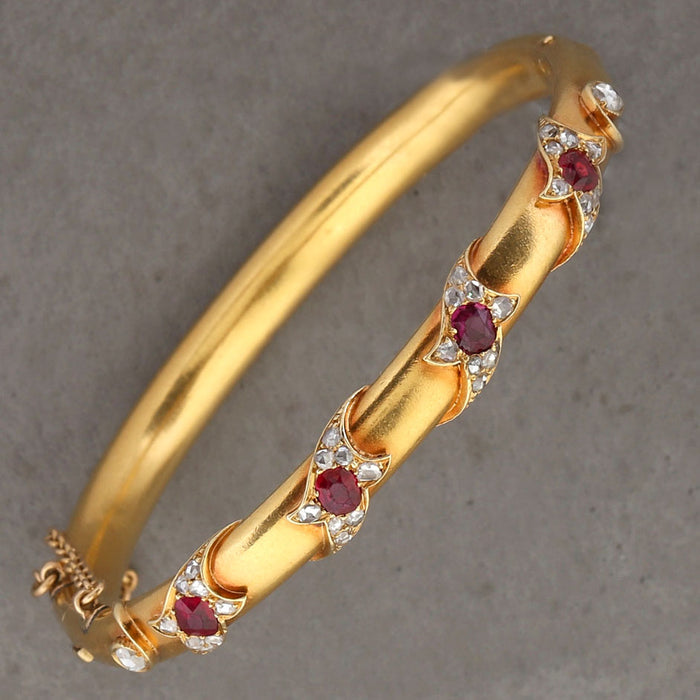 VICTORIAN BURMA RUBY AND ROSE CUT DIAMOND BANGLE IN 18K YELLOW GOLD