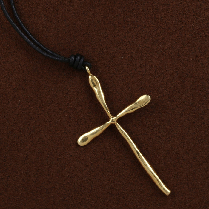 FREE FORM CROSS IN 18K YELLOW GOLD ON BLACK LEATHER CORD 28"