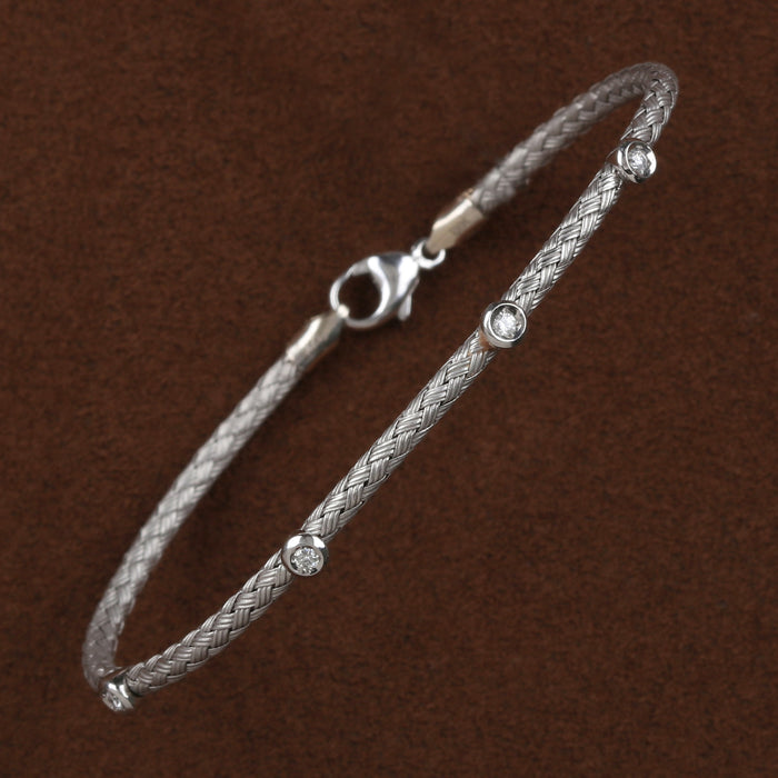 DIAMOND TWIST BANGLE IN 18K WHITE GOLD