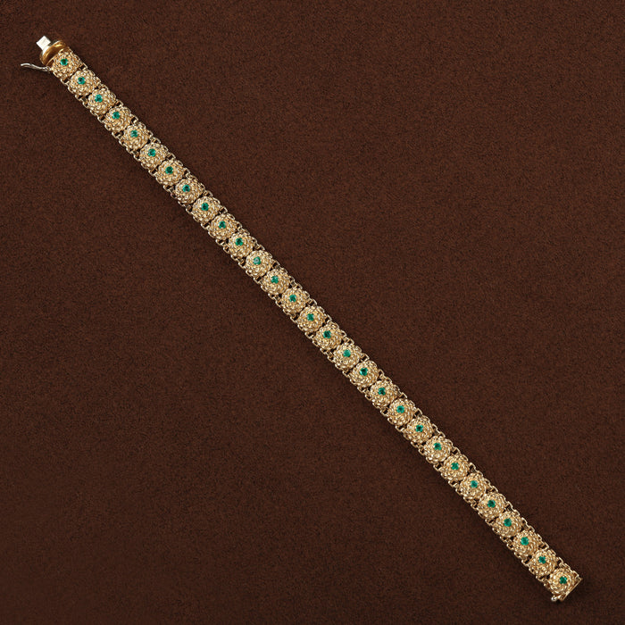 EMERALD TWIST BRACELET IN 18K YELLOW GOLD