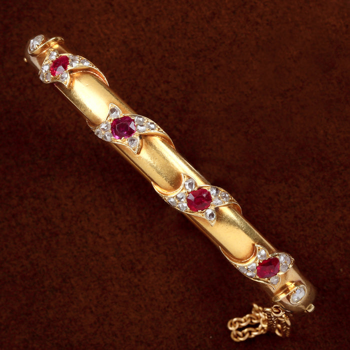VICTORIAN BURMA RUBY AND ROSE CUT DIAMOND BANGLE IN 18K YELLOW GOLD