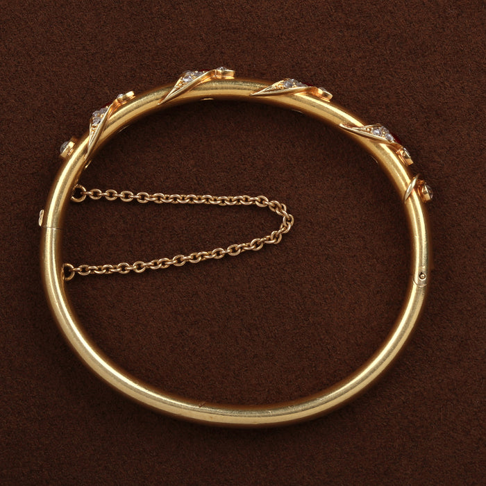 VICTORIAN BURMA RUBY AND ROSE CUT DIAMOND BANGLE IN 18K YELLOW GOLD